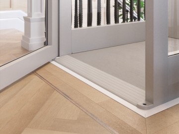 Up-close shot of Bruno Connect Compact home elevator's low threshold for entry