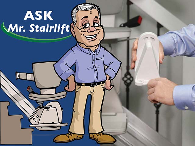 cartoon image of mr stairlift from bruno holding a stairlift part