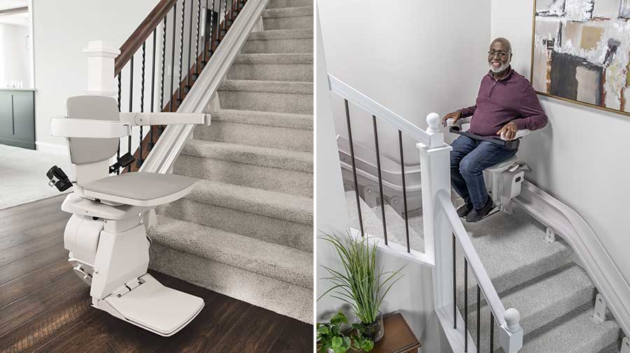 Elan stairlift at bottom of steps and man riding curved stairlift