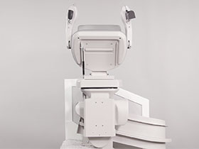 Bruno Elite curved stairlift fold up at top of the steps