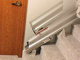 Bruno straight stairlift folding rail on staircase