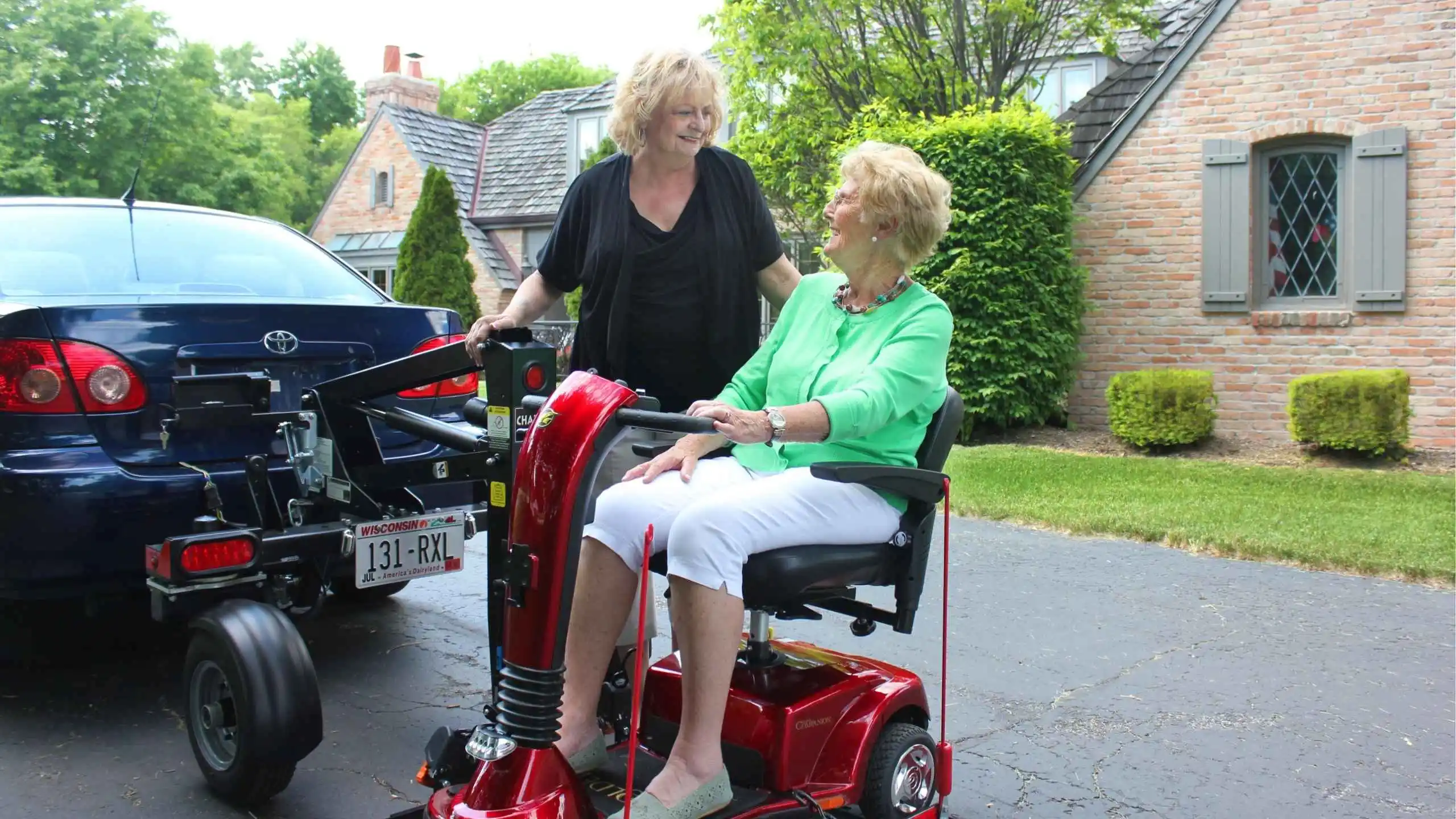 two women on a scooter