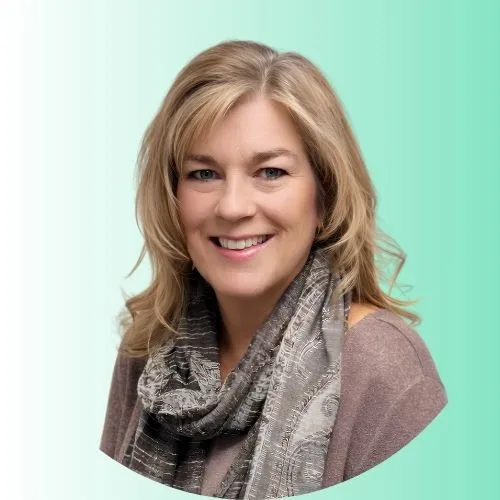 a woman with blonde hair wearing a scarf