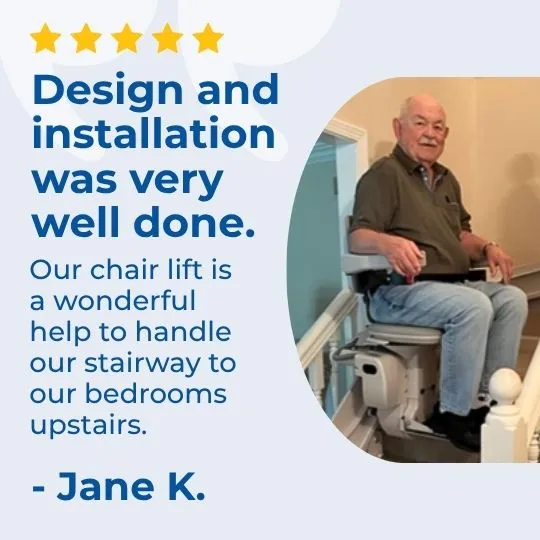 an older man sitting on a stair lift