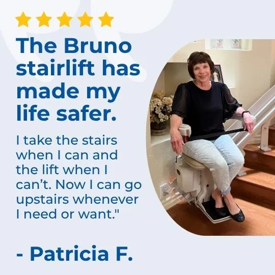 a woman sitting on a stair lift