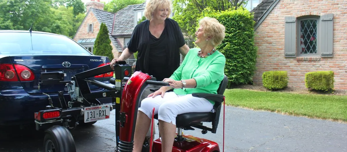 chariot scooter lift behind a car