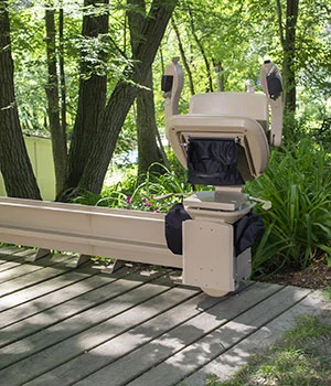 Elite Curved Outdoor Stair Lift footrest arms and seat folded
