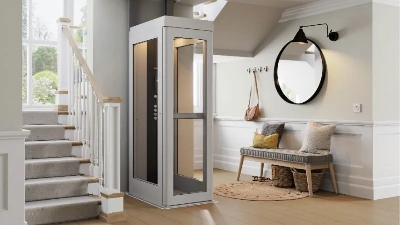 a room with a mirror and stairs
