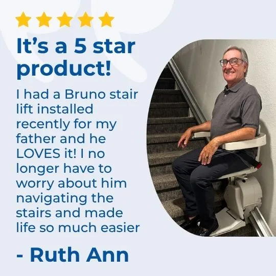 a man sitting on a stair lift