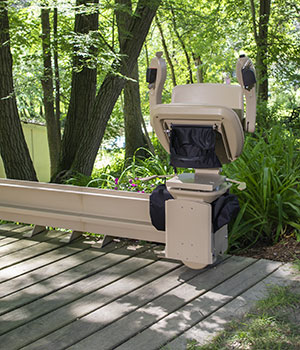 Elite Curved Outdoor Stair Lift footrest arms and seat folded